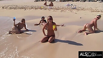 Six Passionate Lesbians Indulge In Sensual Beach Play